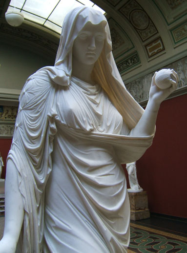 Statue of Penelope with her ball of yarn